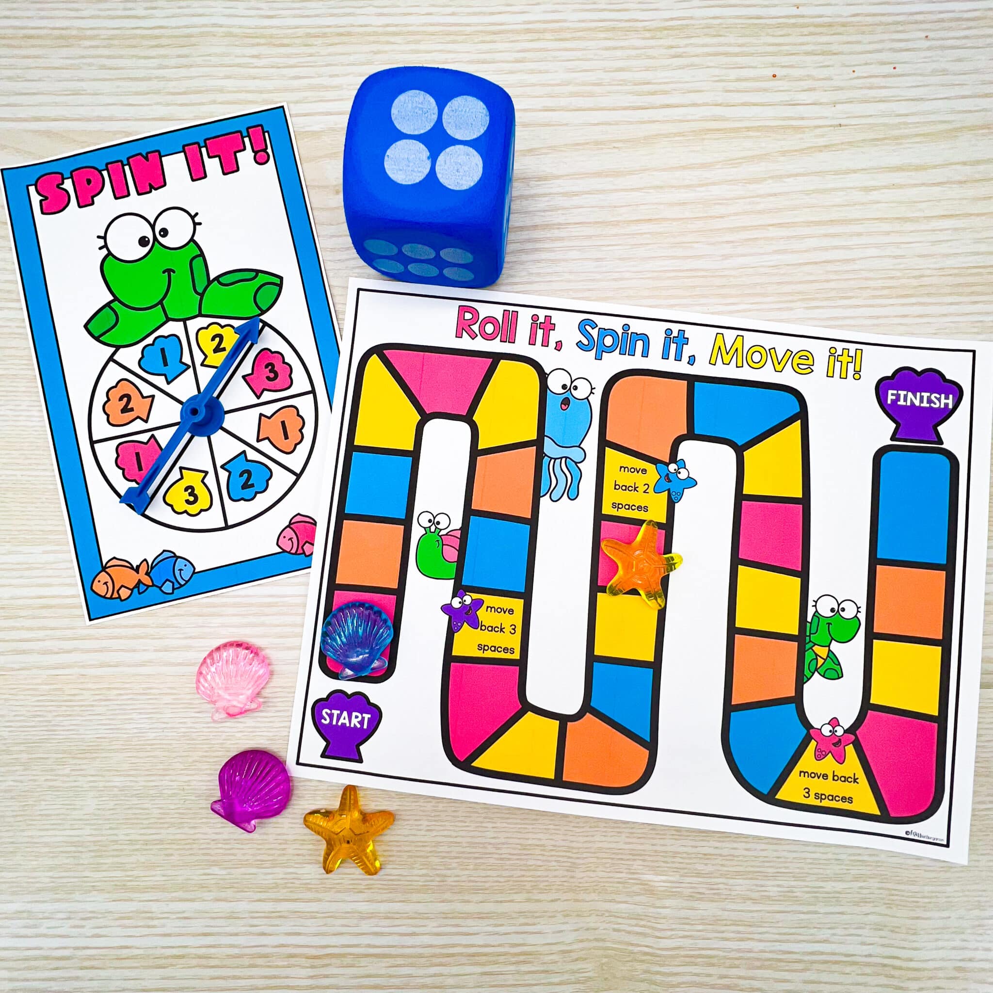 Roll It, Spin It, Move It game board and spinner