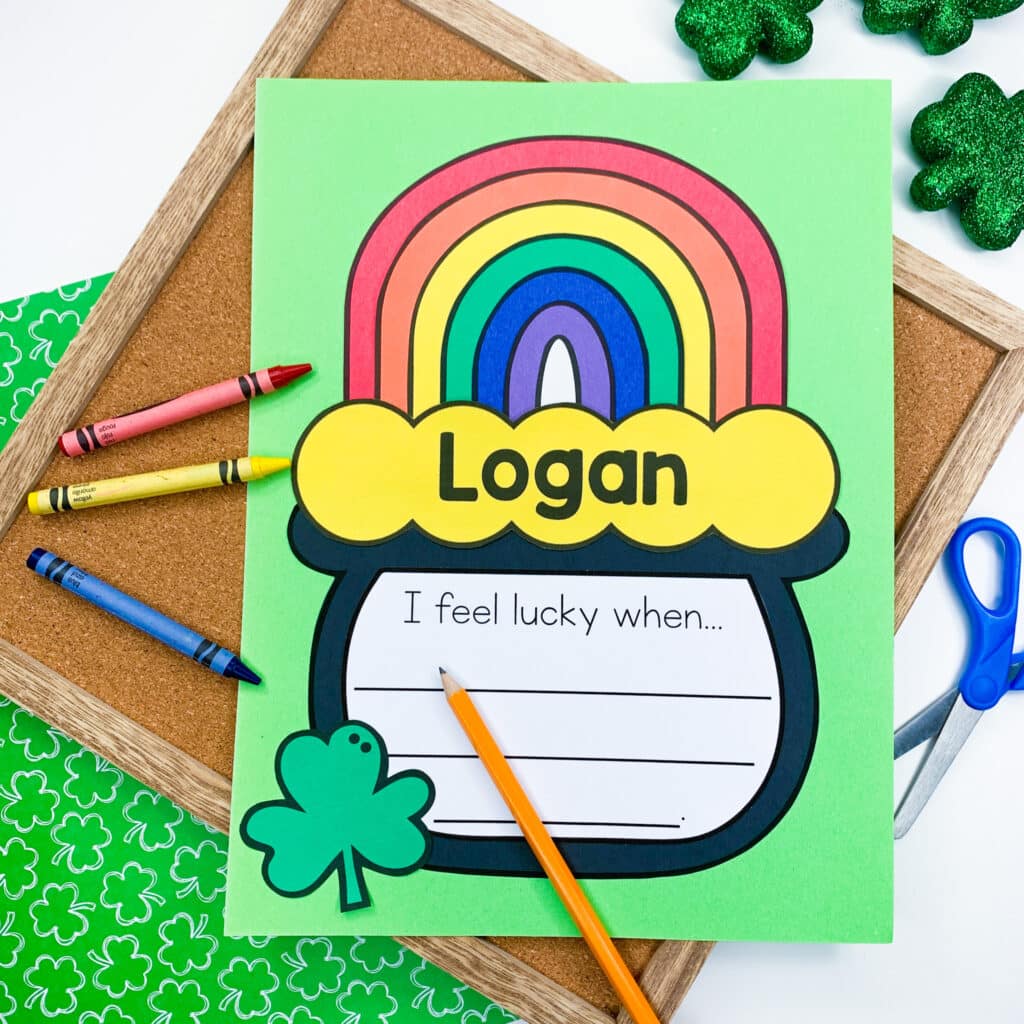 Paper craft with rainbow coming out of a pot of gold. Student name is displayed on the gold coins.