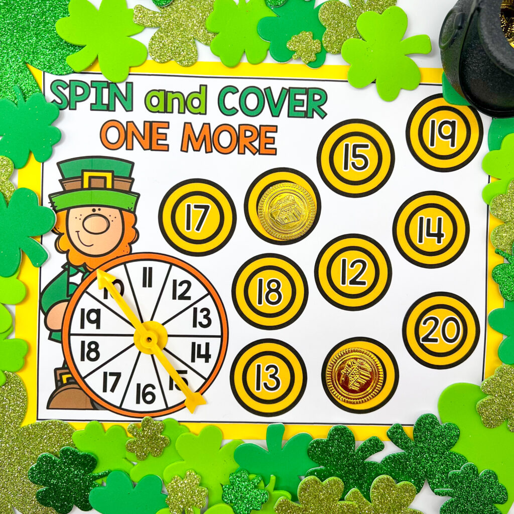 Spin and Cover One More center being used with gold coin manipulatives.