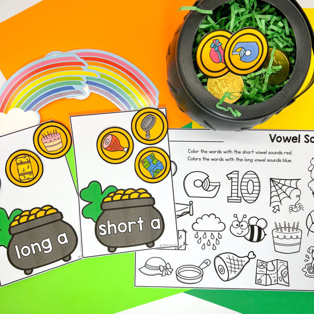 Vowel Sort center is shown in use, with the paper gold coins being stored in a plastic pot of gold.