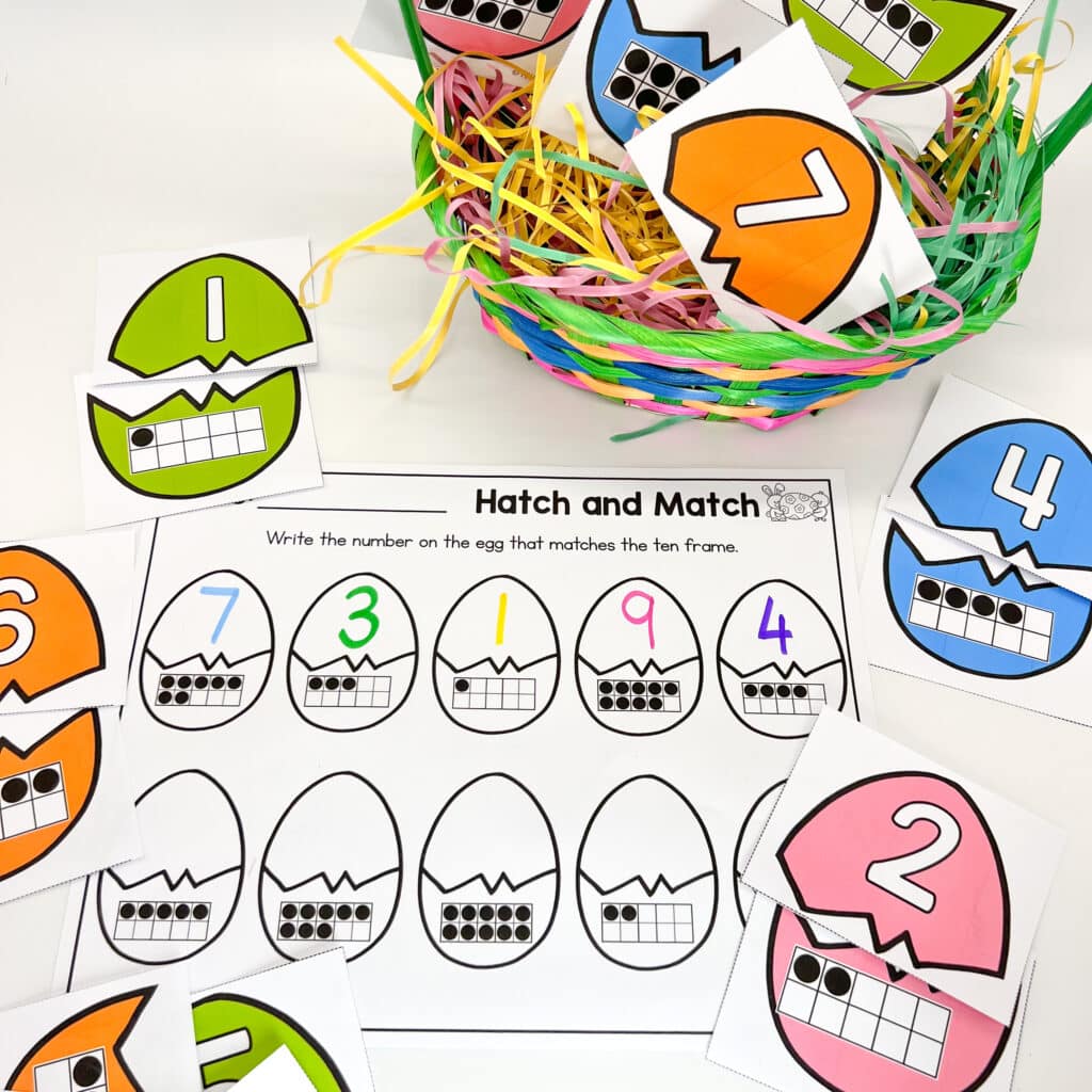 Colorful paper egg halves are being matched up for an Easter kindergarten center activity.