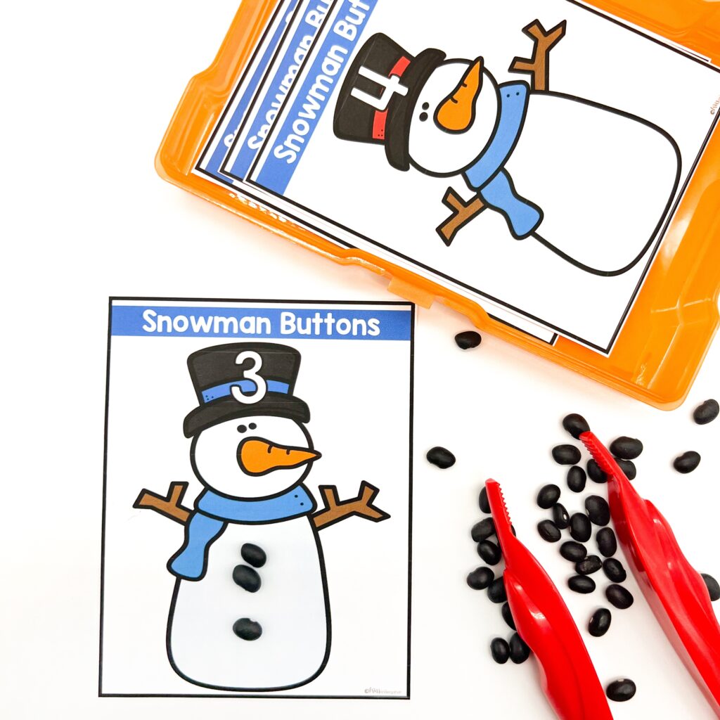 Adding black beans for snowman buttons