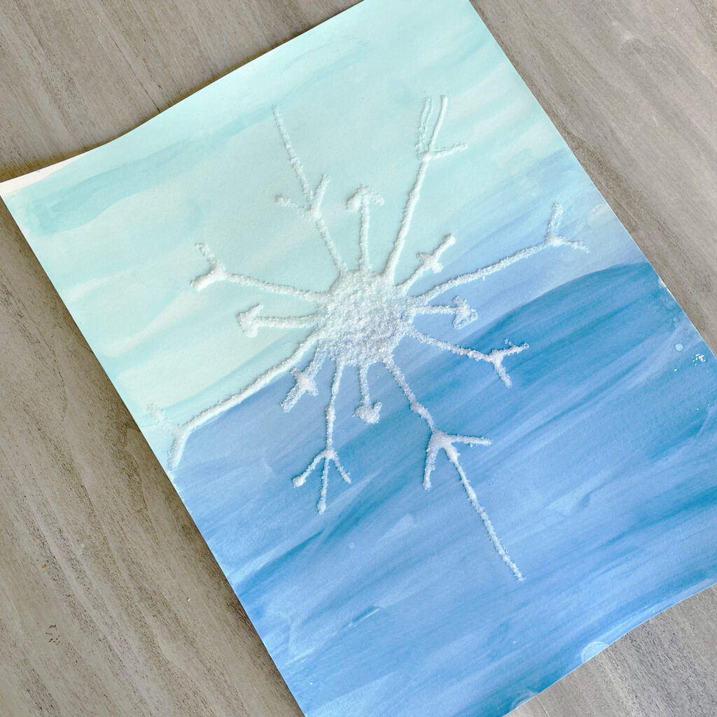 Snowflake art made with glue and salt