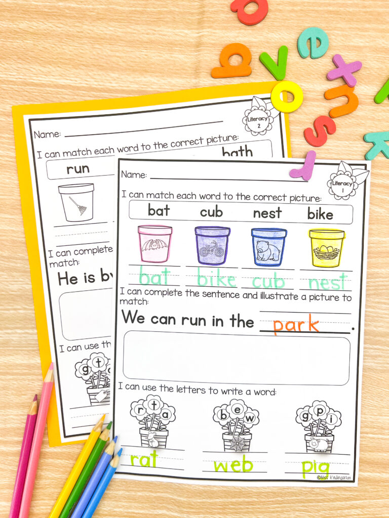 A completed morning work literacy printable with sand buckets and flowers
