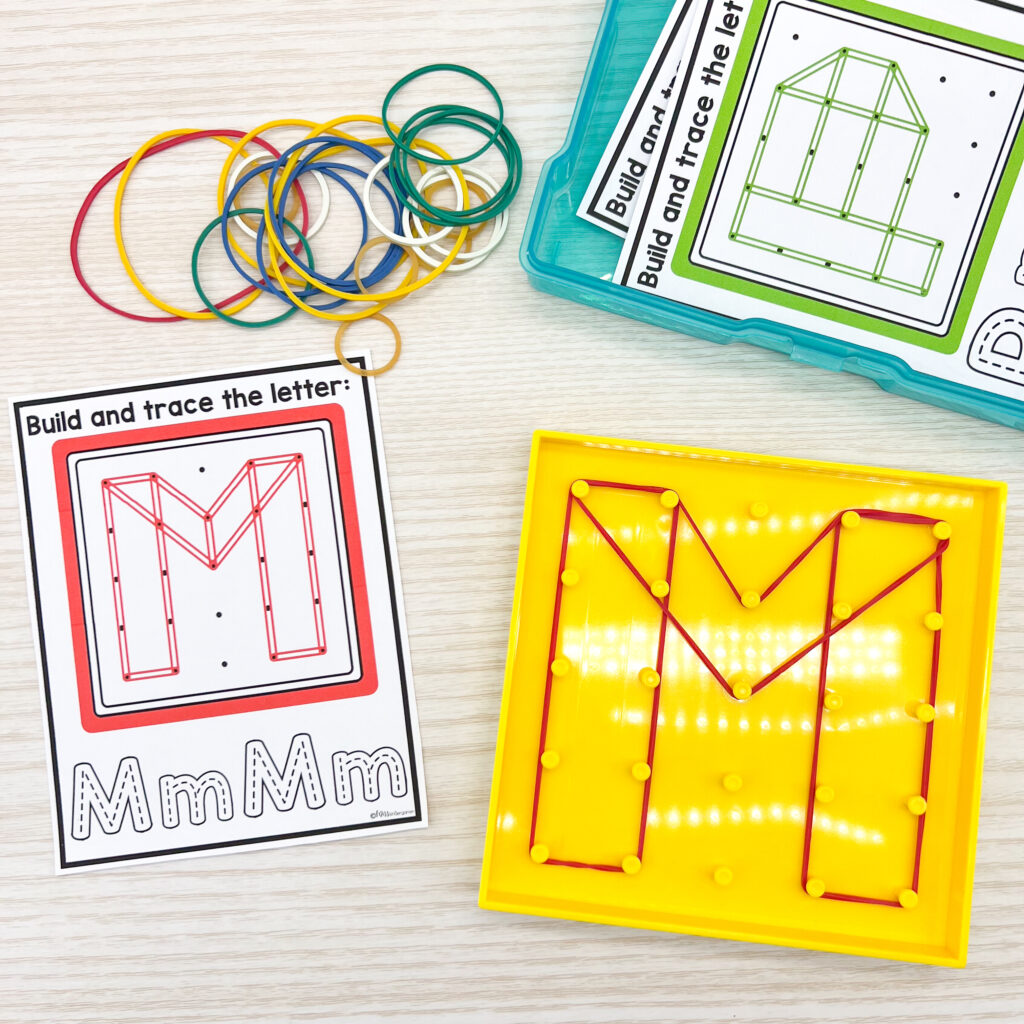 Creating the letter M on a geoboard with rubberbands