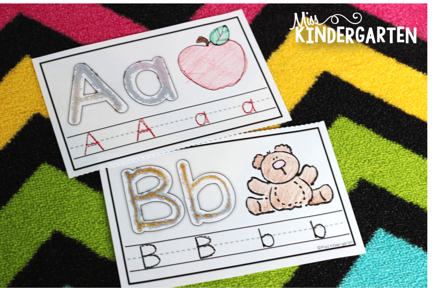 Alphabet mats for the letters A and B with glitter on the letters