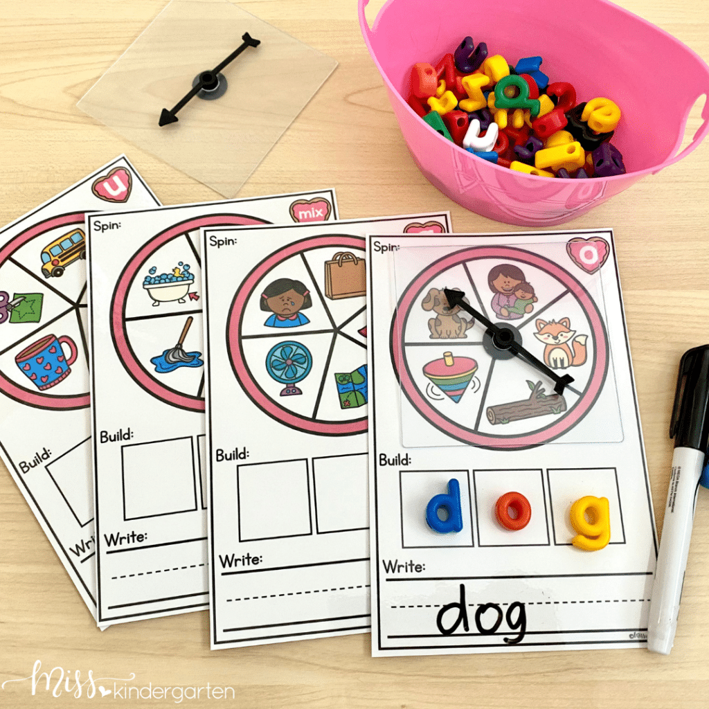 A spin, build, and write activity is in use on a desk.